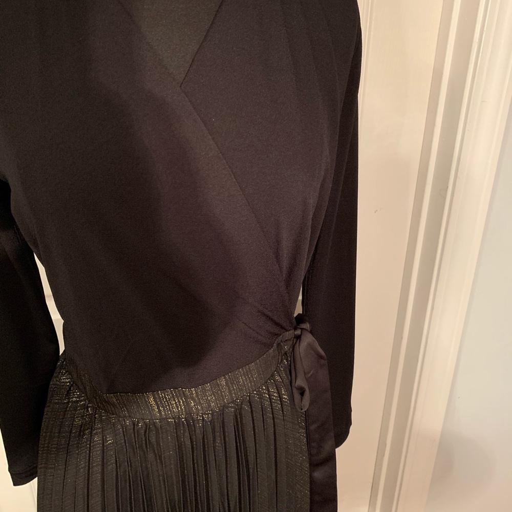 Beautiful black formal gown with a hint of gold
